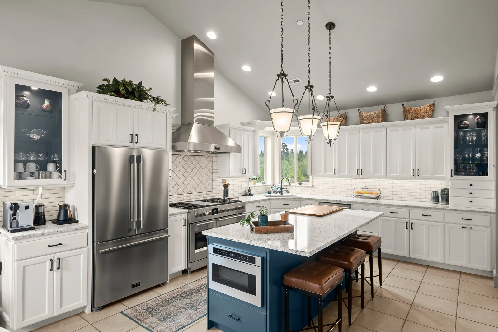White cabinetry & blue island